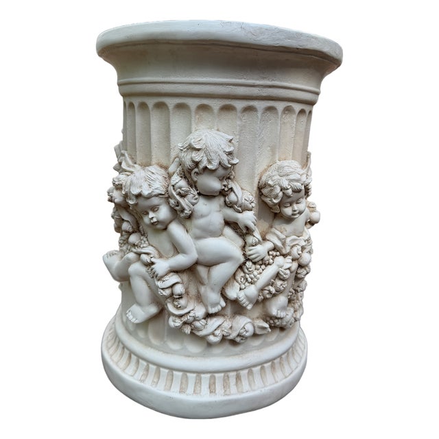 Decorative Corinthian Column in Classical Style With Cherubs Holding a Floral Swag For Sale