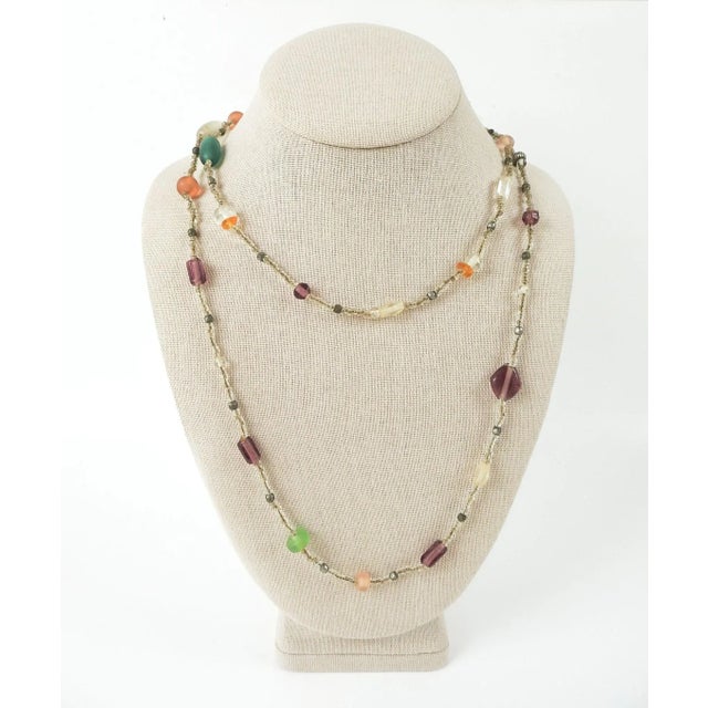 Vintage circa 1930's multicolor long strand beaded necklace. Various glass beads, some frosted, various shapes, various...