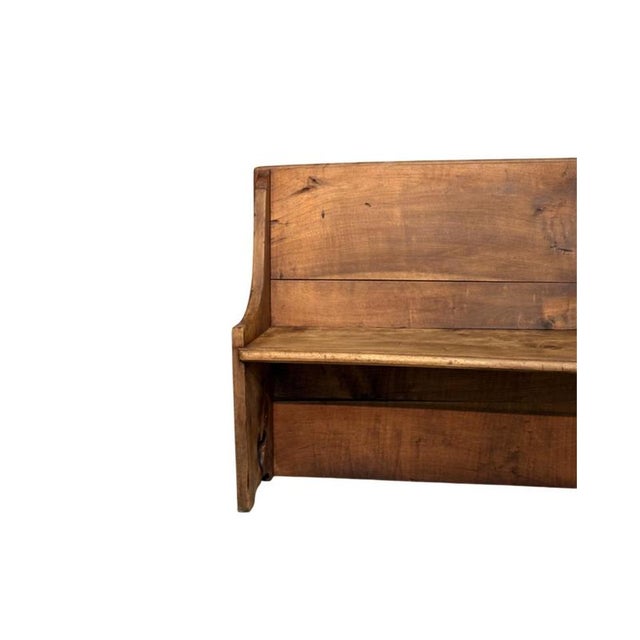 Antique walnut bench dating back to the 19th century, embellished with a delicate heart motif carved into the sides. Solid...