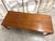 Teak coffee table from the 1960s. Features a small pull-out shelf on one side. Danish design attributed to johannes...