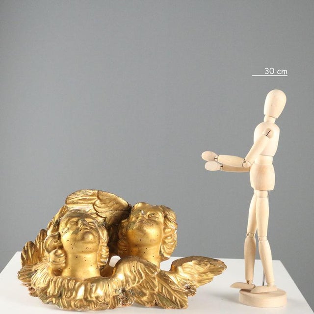 Pair of cupids in carved and gilded wood. This piece is attributed to the mentioned designer/maker. It has no attribution...