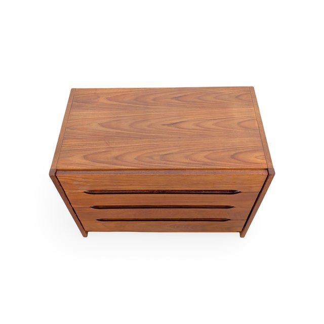 We are offering a beautiful small vintage chest of drawers from the 1960s, made in Denmark, for sale. Designed by Erling...