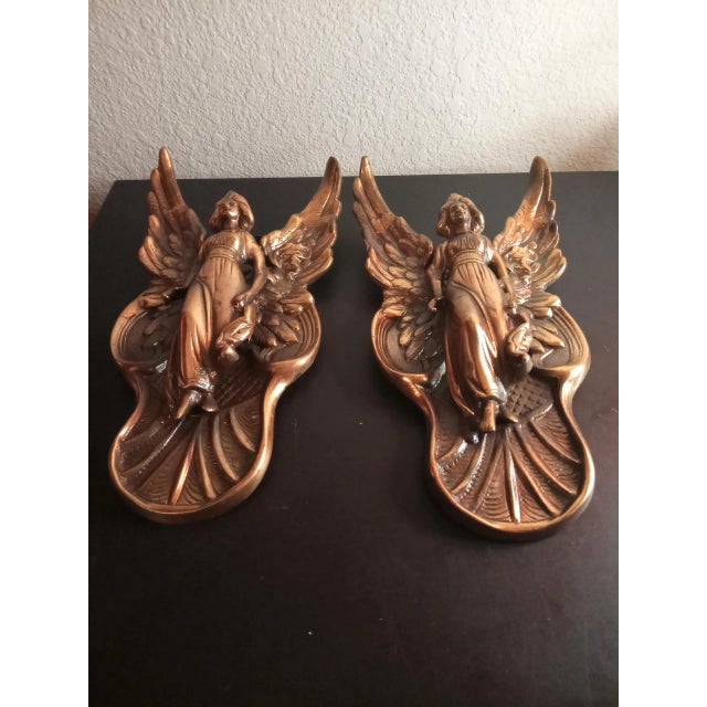 These are Bronzed 10" Sculpture of Winged Angel Wall Decor Set of 2 Procured at auction BOX 41