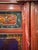 Asian Style Early 20th Century Chinese Red-Lacquer Carved Wood Armoire With Hand painted Panels For Sale - Image 4 of 12