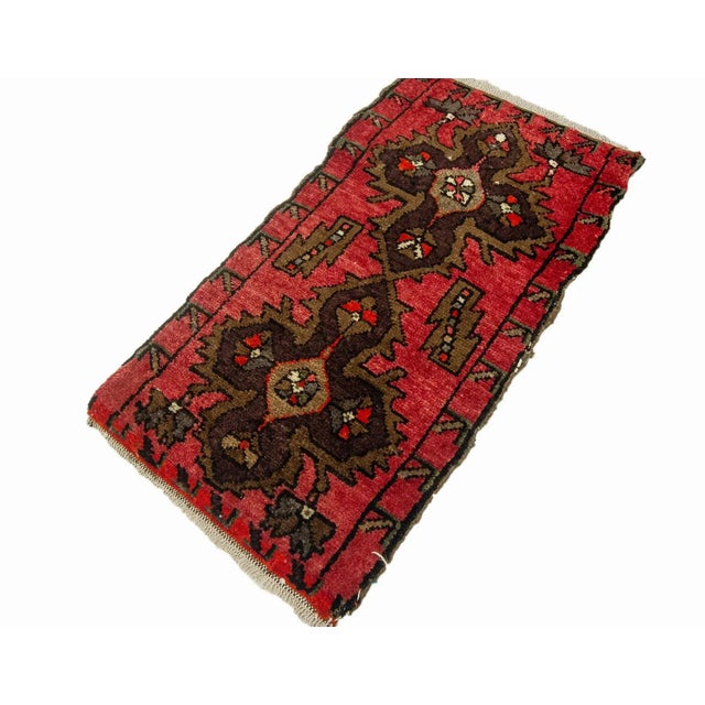 Vintage Handknotted decorative mini rug from Kars region of Turkey. Approximately 45-55 years old. In very good condition.