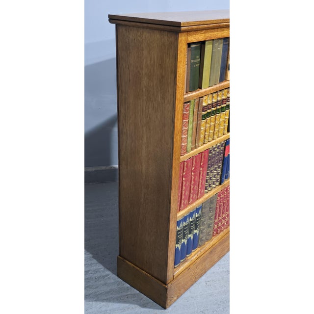 A very good Edwardian Golden oak open adjustable library bookcase with three shelves, in very nice original home ready...