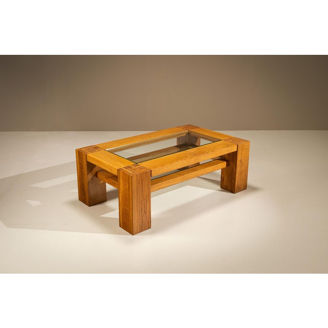 Some furniture speaks through ornament; other pieces rely entirely on craftsmanship. This coffee table, most likely...