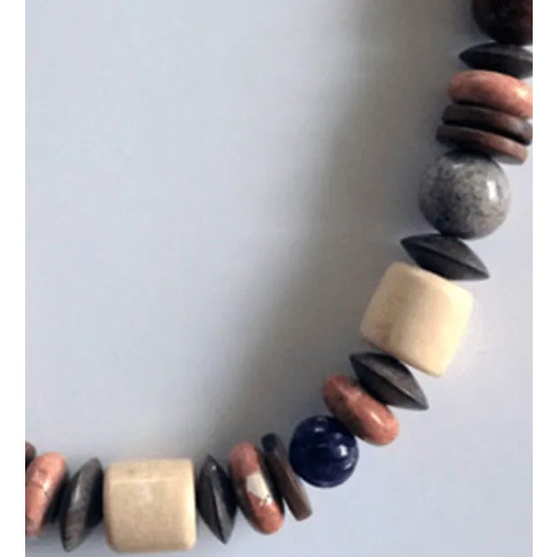 Trust me, the picture doesn’t do this Vintage Wood, Lucite and Stone Necklace justice. This earthy, handmade vintage...