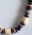 Trust me, the picture doesn’t do this Vintage Wood, Lucite and Stone Necklace justice. This earthy, handmade vintage...