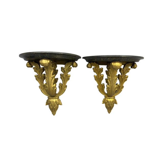A fine pair of Syroco Wood gilded acanthus leaf demi-lune wall mounted shelves. Circa 1950-60. Signed on the reverse with...