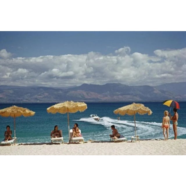 Private Island, Philippines 1973 by Slim Aarons Slim Aarons Limited Estate Edition Guests relax on the beach of a private...