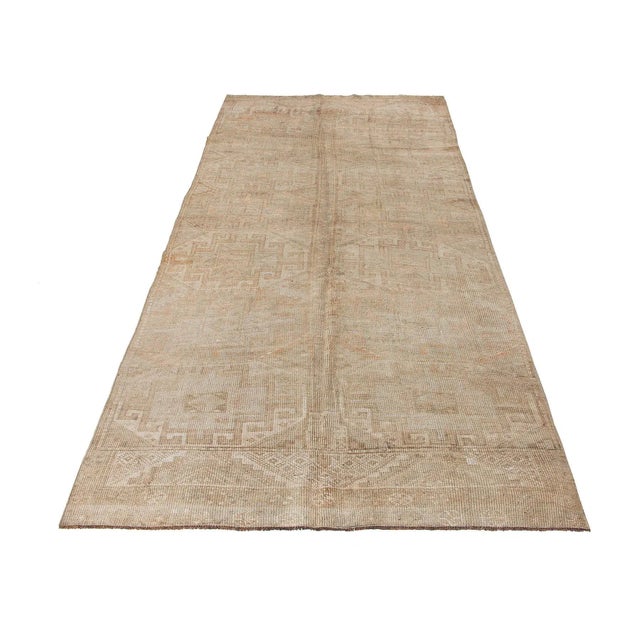 Vintage handknotted decorative wool rug from Kars region of Turkey. Approximately 50-60 years old. In very good condition.