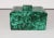 A Malachite stone rectangle stone box. Beautiful green veined. The box has a sperate top with stone handle. Measures 4 ¼”...