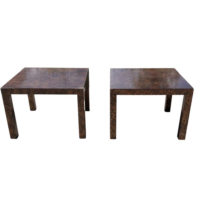 Offered is a pair of vintage Henredon side tables in a striking faux tortoiseshell lacquer finish. Designed in the sleek...