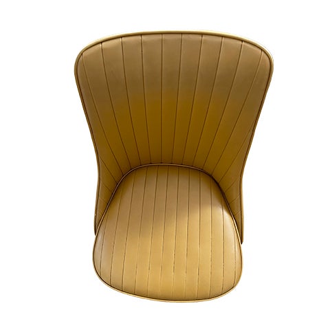 A striking pair of authentic vintage Chromcraft swivel lounge chairs showcasing the clean architectural lines and...