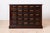 Rich in character and timeless craftsmanship, this exceptional Early 20th Century Apothecary Chest of Drawers embodies the...