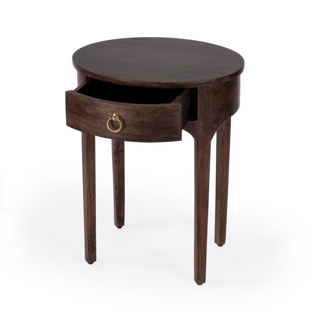 The curved lines of this end table give this piece it's unique look. It features a gorgeous dark brown finish on solid...