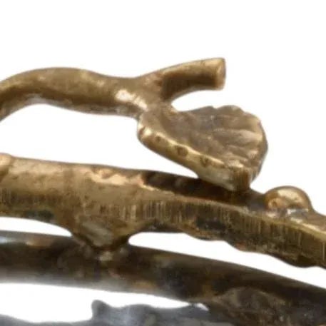 Beautiful hammered stainless steel bowl with antique brass twig. Display on a sofa table in the sunroom or a console in...