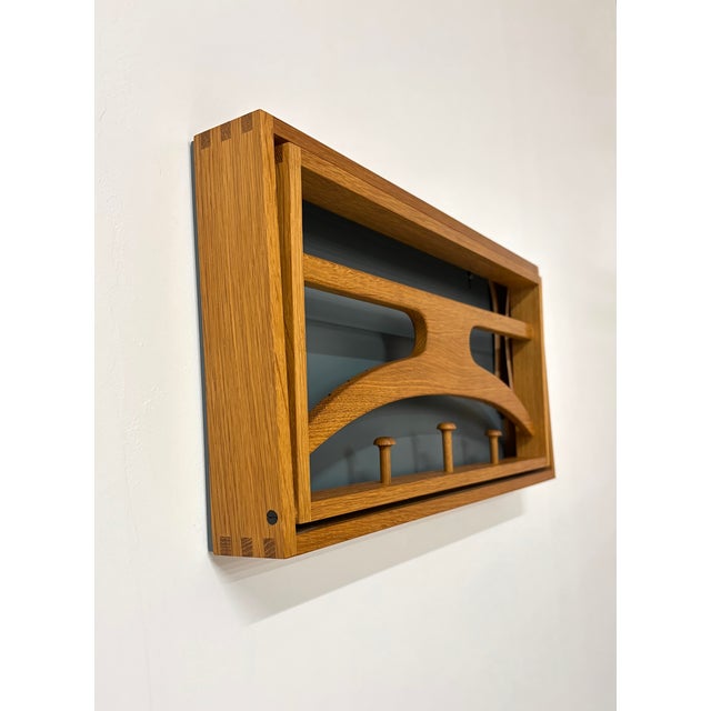 Vintage Danish Wall hanged valet in oak, 1960s. This piece has an attribution mark, I am sure that it is completely...