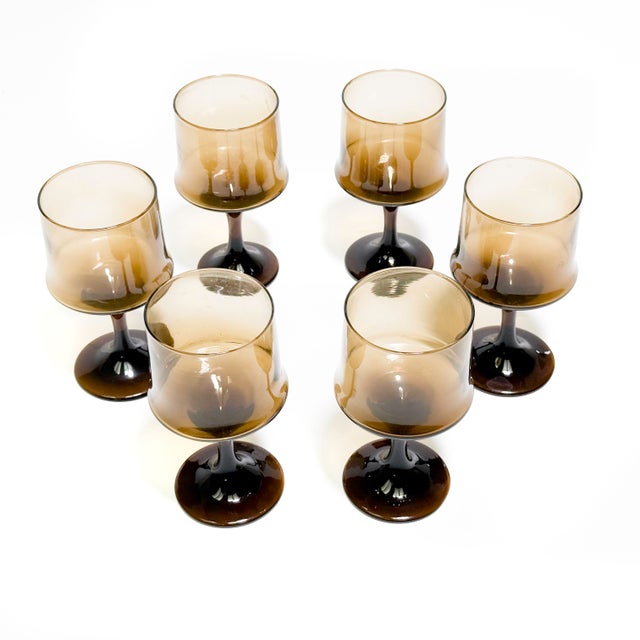 Sip in style with this mid century mod 6 piece set by Libbey Glass Company. This design was called Tawny Accent and the...