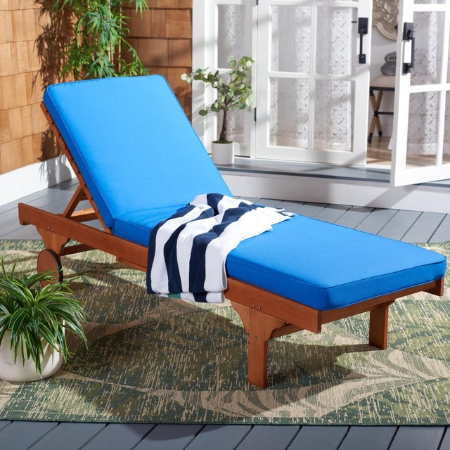 A fresh update of an English garden classic, the Newport Outdoor Lounge Chair recalls the manicured landscapes of Rhode...