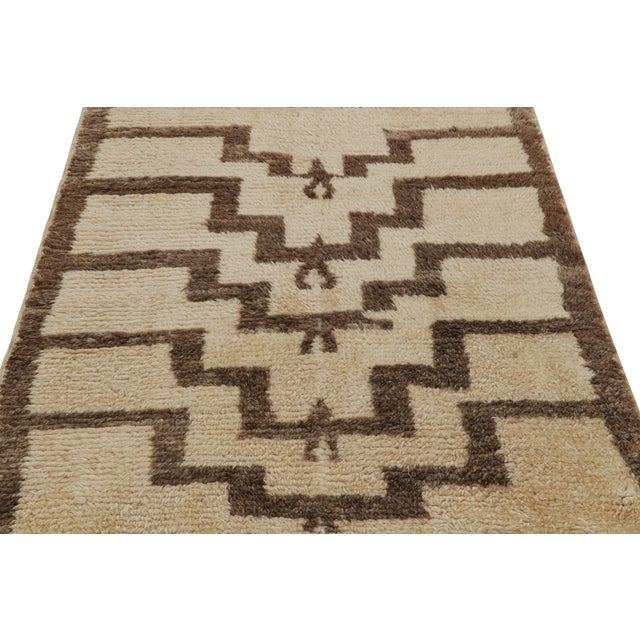 Hand-knotted in wool, this 4x4 vintage Tulu rug, circa 1950-1960, is among the family of Tulus with minimalist geometric...