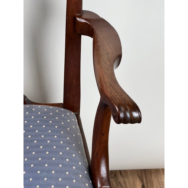 A refined late 18th century Chippendale period walnut armchair, this piece embodies the balance and craftsmanship that...