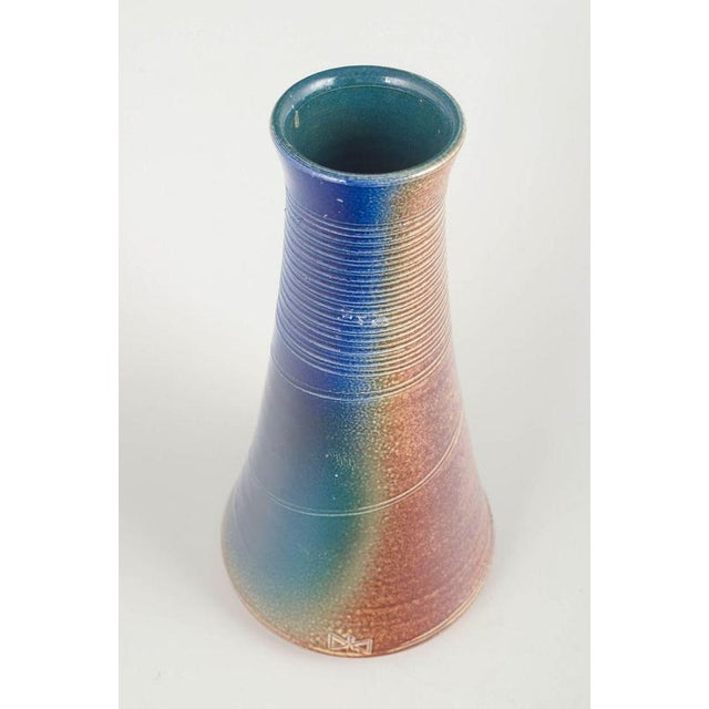 Swedish Studio Potter Unique vase, 1980s. Tall conical stoneware vase with multicoloured glaze in shades of blue, green...