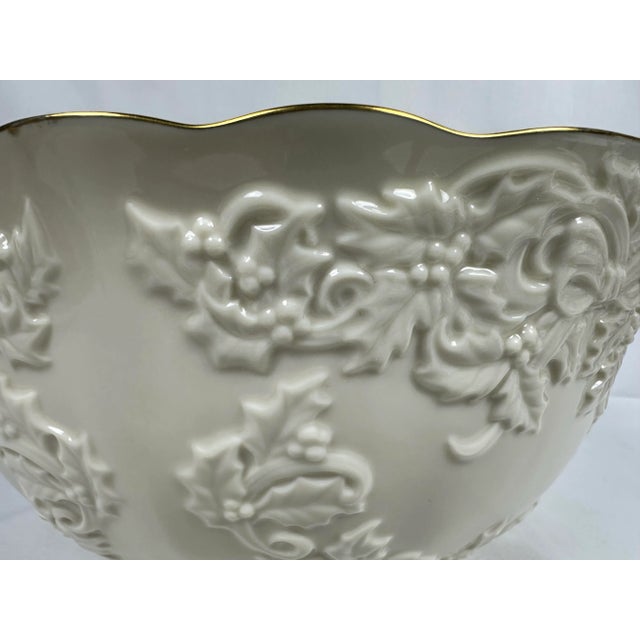 This elegant vintage Lenox Embossed Holly and Berries Ivory Porcelain Gold Rim Punch Bowl is absolutely stunning and will...