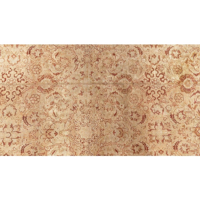 A stately antique Oriental Amritsar rug, woven in India in the first quarter of the twentieth century. It is an absolutely...