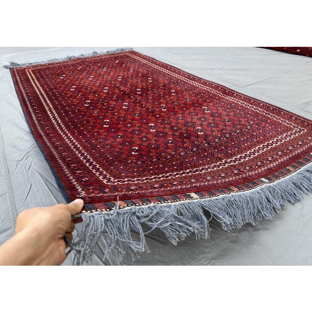 A vintage Afghan Beshir (Bashiri) rug from Kunduz — the Ersari-Turkmen weaving group prized for refined all-over lattice...