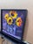 Sunflowers in Blue Bottles 2017 13 H x 13 W in. By Kathleen Varadi A vibrant contemporary floral still life featuring...