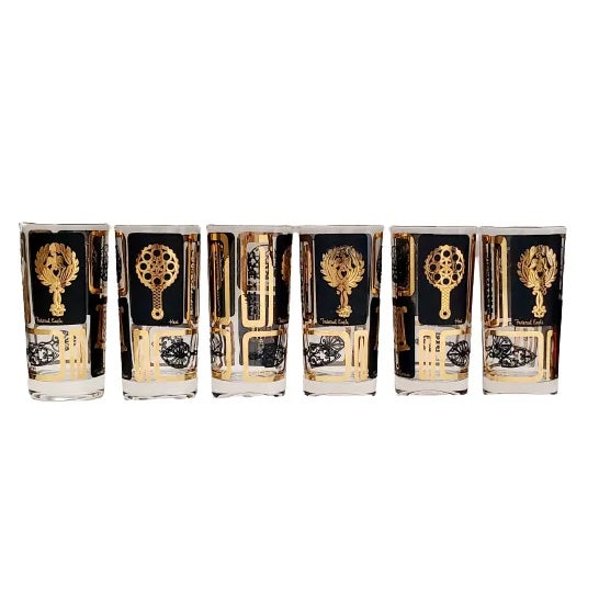Mid century cocktail tumblers with trivets in black and gold on clear glass, set of six. Perfect gift for your favorite...