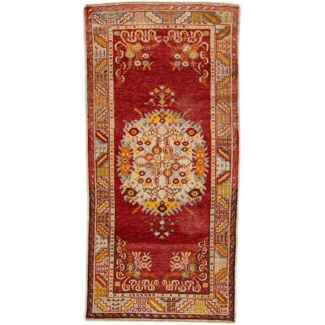 Textile 1920s Red Antique Handmade Khotan Wool Rug With Medallion Motif For Sale - Image 7 of 7