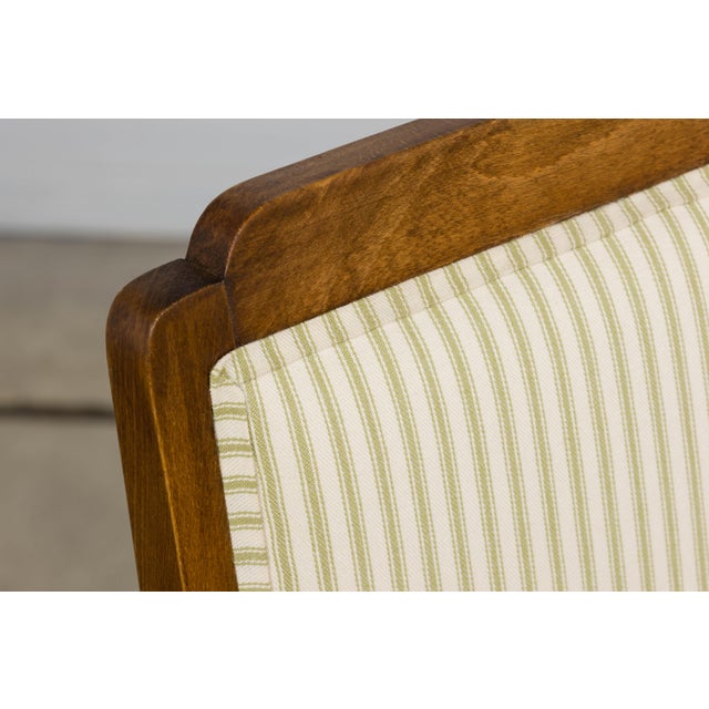 A refined pair of French Art Deco side chairs sourced in Provence, France. The chairs feature a clean, rectilinear...