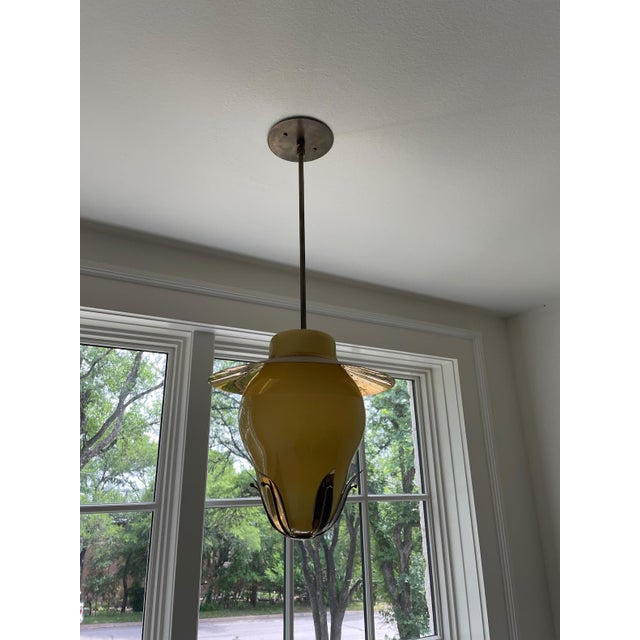 Opaline Glass and Brass round fixture, with brass 'leaves' and perforated brass top.