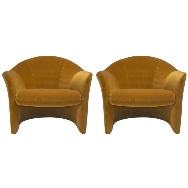 Stylish modern pair of club chairs in the style of Milo Baughman. Original upholstery. Upholstery is in very good...