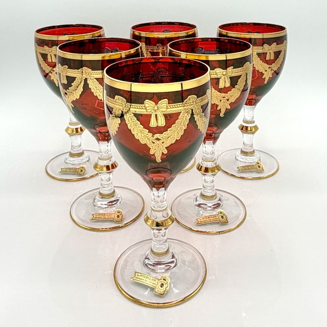 Set of 6 vintage italian ruby red wine goblets with 24k gold neoclassical garlands by interglass, 1980s an impressive set...