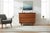 This beautifully restored Mid-Century Modern walnut chest of drawers is a timeless example of clean architectural design...