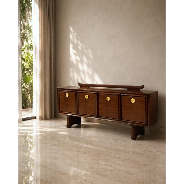 This elegant sideboard, designed by Paolo Buffa and produced in Italy during the 1940s, perfectly exemplifies the...