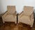 This beautiful and elegant pair of armchairs is made of gouged wood and mottled fabric. It is a French work in the Art...