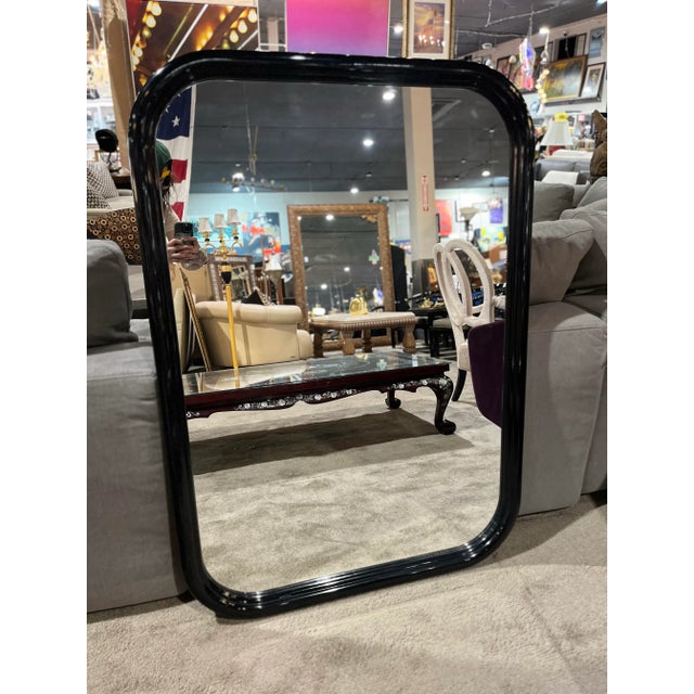 Elevate any space with the sleek sophistication of the Henredon “Scene 3” Wall Mirror. Crafted from rich black wood, this...
