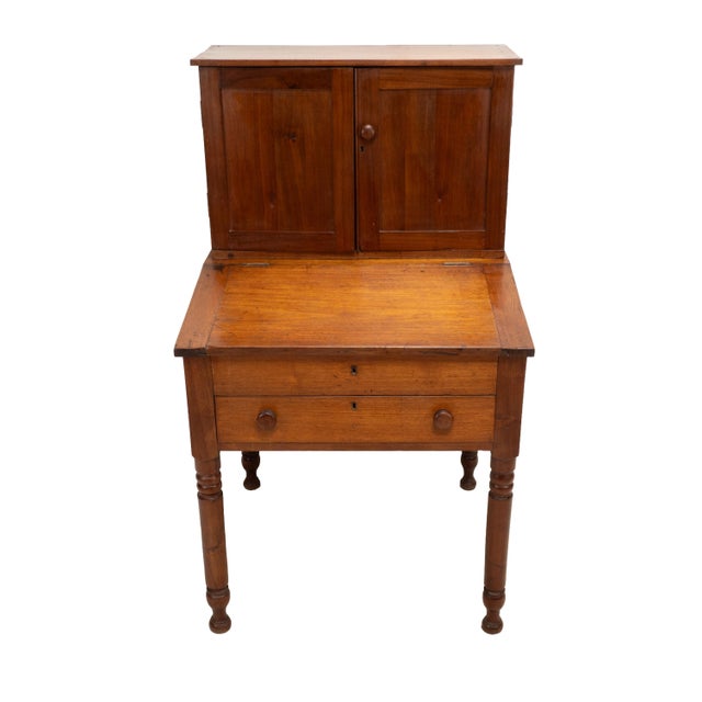 This charming antique cabinet is a beautifully proportioned piece with the warmth and character that only comes with age....