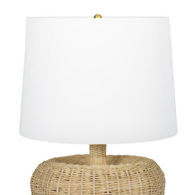 Illuminate your space with the Avery Lamp, showcasing a base with soft, heart-like curves and a sleek, elongated neck that...