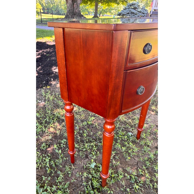 Gorgeous Bombay Company cherry Federal-style table or nightstand with two bow front drawers. It is in excellent condition...