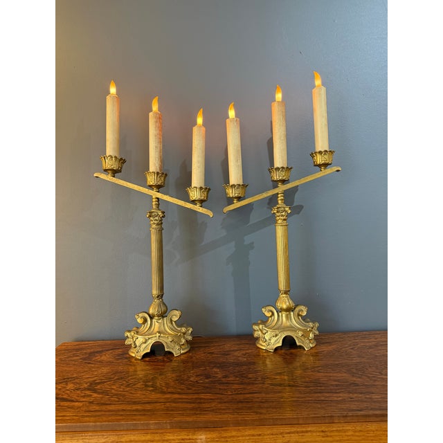 These can­de­labras have gorgeous art nouveau bases and Roman column stems embell­ished with religious motifs. The three...