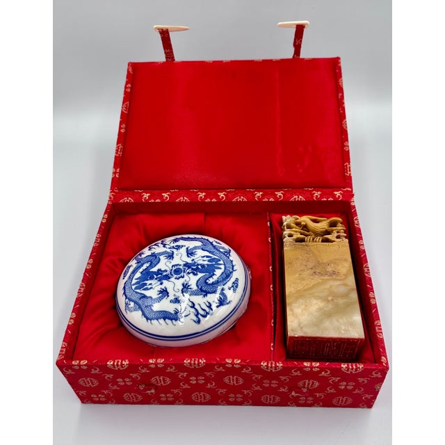 Discover the captivating allure of this exquisite Chinese Art hand Carved Soapstone Seal Stamp & Red Ink Pot Set. This...