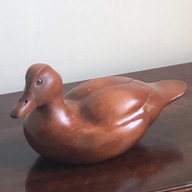 Offering a beautiful hand-carved duck decoy by retired master decoy artist John Owen. A native of England, Owen resides...