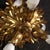 An elegant Italian flush-mount ceiling light from the second half of the 20th century. Crafted from gilt metal and adorned...