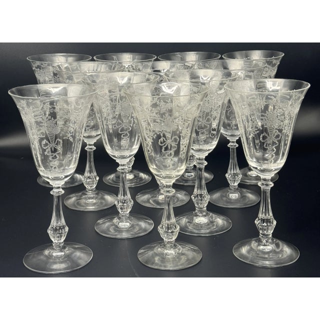 Presenting a beautiful condition set of 12 water goblets by Fostoria Glass Company in the Corsage clear pattern. They...